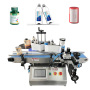 Full-auto round bottle labeling machine Model : RL-100